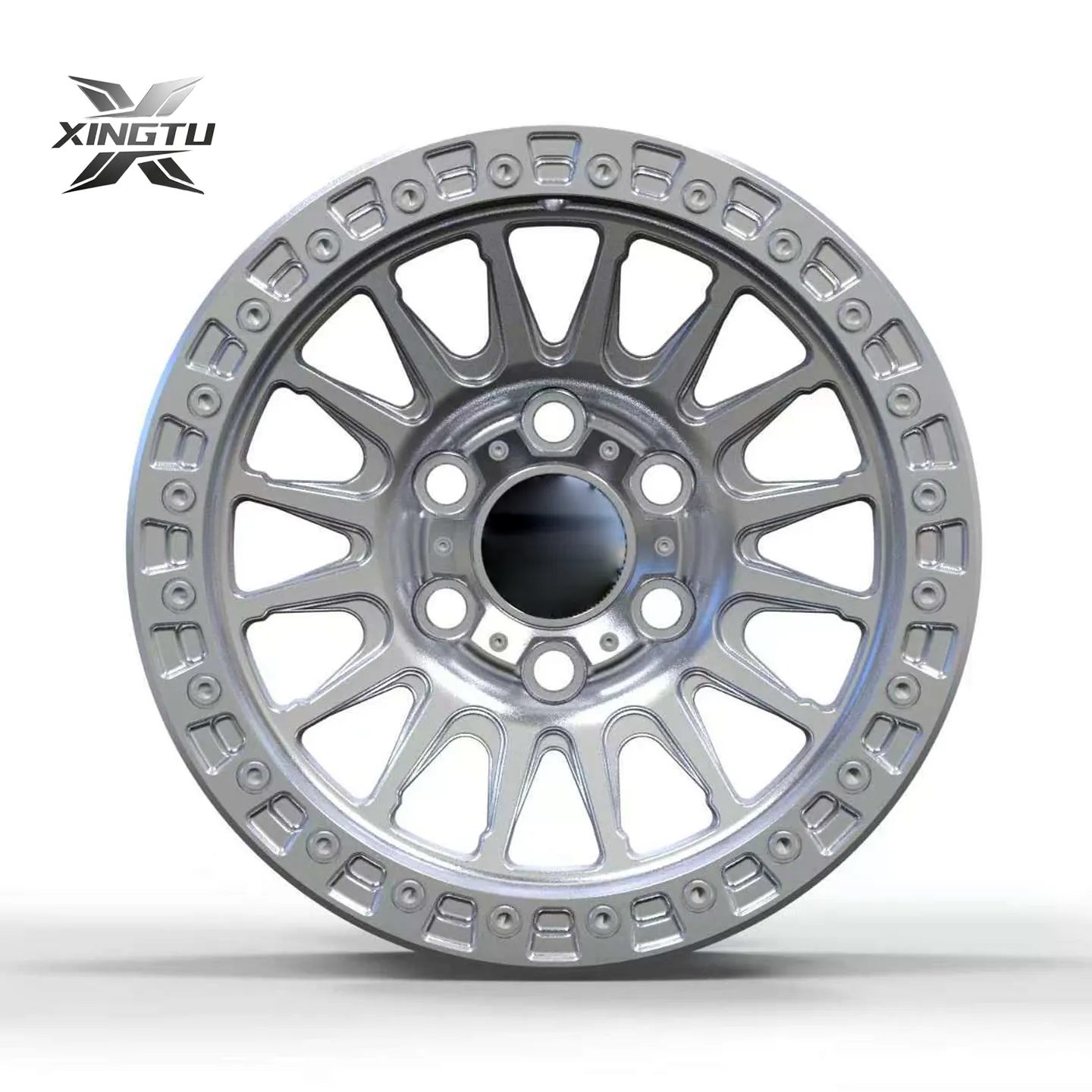 Front-facing forged monoblock wheel with intricate multi-spoke pattern and aluminum ring
