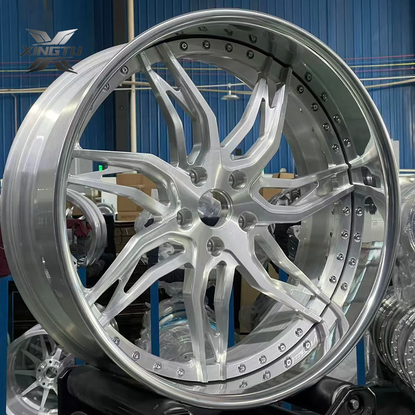 Three-quarter view of three-piece forged wheel showing deep polished barrel and rim
