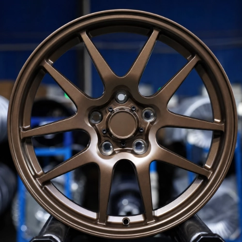 Finished Chevrolet Camaro drag racing front wheel with metallic bronze spokes
