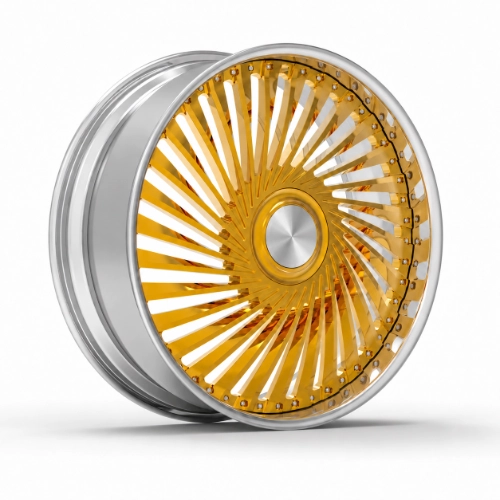 Angled view of gold turbine forged wheel with polished silver outer rim