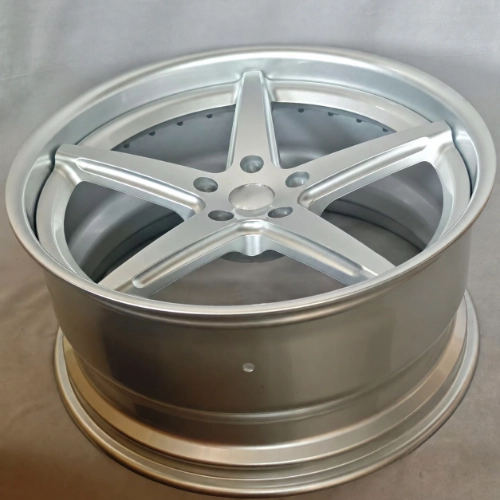 Finished 22 inch forged monoblock wheel showing stepped rim and silver spoke contours