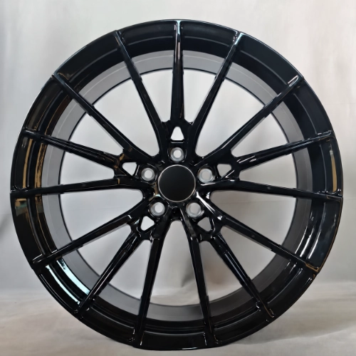 Finished BMW M340i forged wheel with narrow black spokes and open brake windows