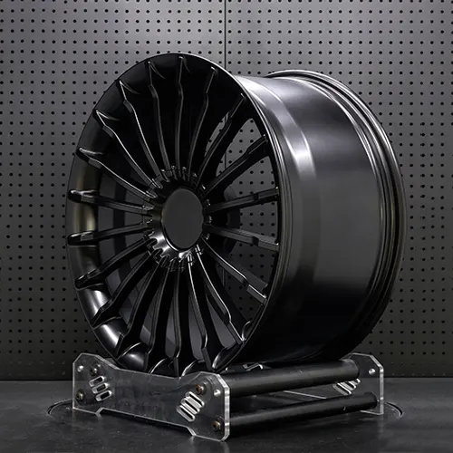Side angle of 21 inch forged monoblock wheel with turbine-style spokes and wide rim