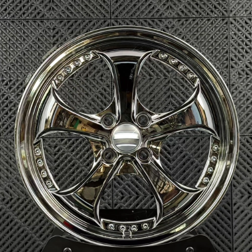 Front view of Mazda MX-5 forged wheel showing five-spoke pattern and decorative bolt details