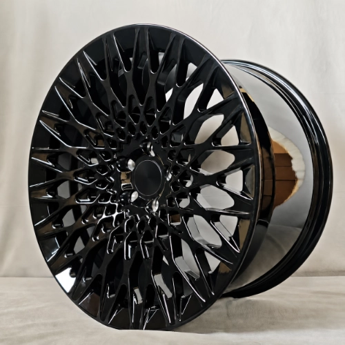 Ferrari SF90 forged monoblock wheel with intersecting mesh spokes and recessed center