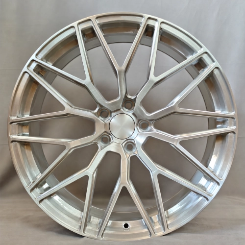 Front view of brushed silver Mustang forged wheel with angular Y-spoke pattern