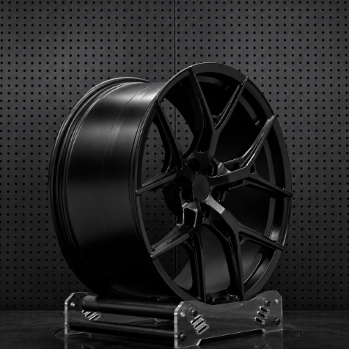 Front-facing Audi 22 inch forged wheel with matte black split five-spoke pattern