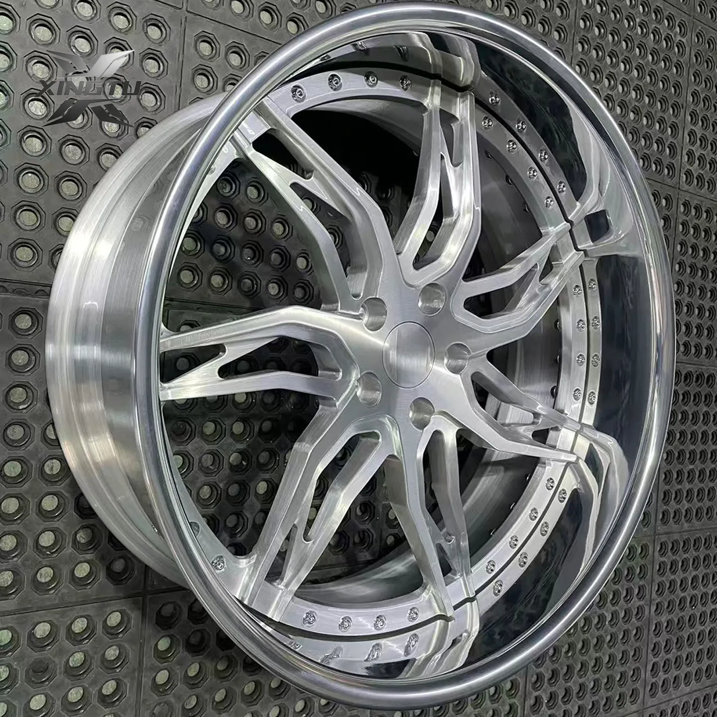 Finished 22 inch forged wheel with brushed aluminum spokes and reflective outer lip