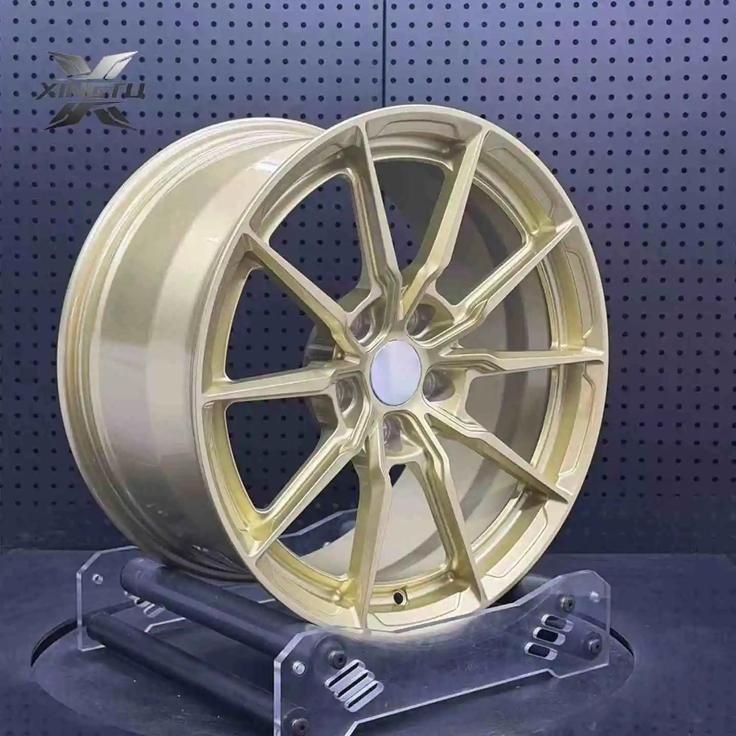 Three-quarter view of 18 inch forged wheel with reflective gold finish and deep barrel