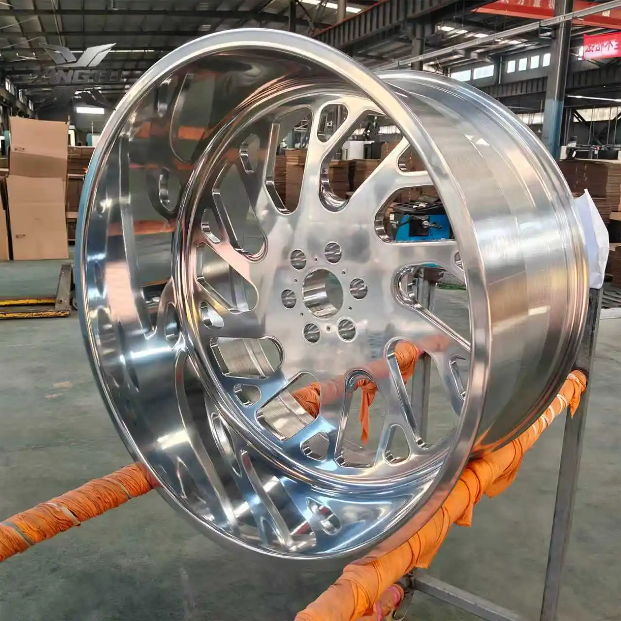 Three-quarter view of 26 inch polished forged wheel showing deep lip and barrel profile